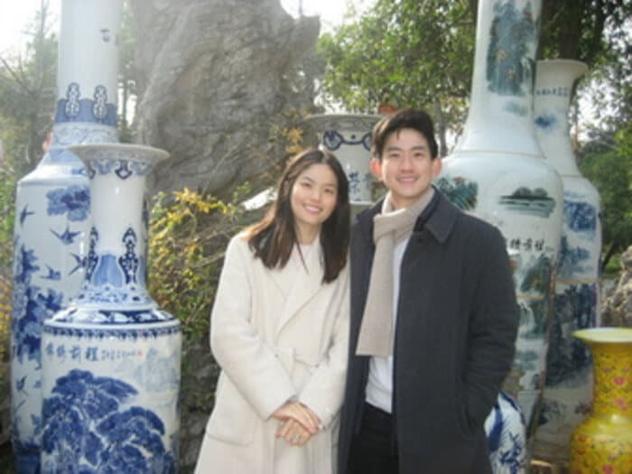 Beside blue-and-white porcelain vases